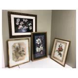 4 framed prints in frame behind glass