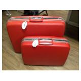 Pair of vintage red Samsonite hard suitcases