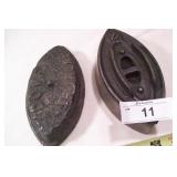 Pair of antique cast iron sad irons