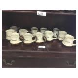 12 named stoneware coffee mugs (c)