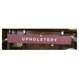 Maroon with White Lettering Wood Upholstery Sign