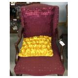 Maroon arm chair w/ pillows