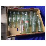 11 Returnable Coca-Cola Bottles-Most are 10oz.