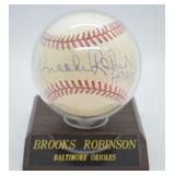 Baseball signed by Brooks Robinson