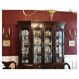 Pair of brass wall sconces and framed cherub print