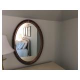 Antiqued Oval gilt mirror