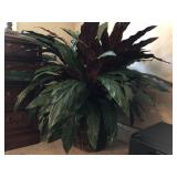 Large faux plant with weaved basket