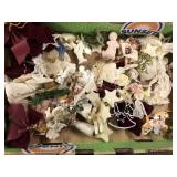 Large assortment of hanging angels