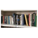 Shelf full of books various titles