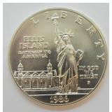 1986 LIBERT SILVER DOLLAR  GEM