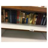 Shelf full of early books