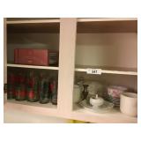 Kitchen Cabinet full of glass items