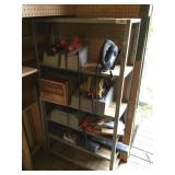 Shelf full of electric tools and shelf