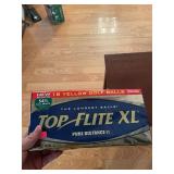 Top Flight Excell Golf Balls And Train Wall