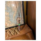 Rug Beater and VMC Brass Trivet