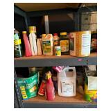 Two Shelves of Gardening Supplies