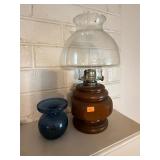 Pair Of Oil Lamps And Blue Vases