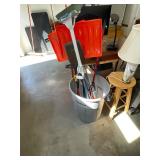 Trash Can and Garden Tools