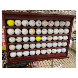 Wooden Shelf with Collectible Golf Balls