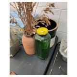 Crock, Juice Bottle, and Pottery