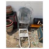 Chair, Step Ladder, and Tomato Cages