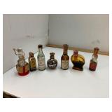 7 Vintage Glass Liquor Shooter Airplane Bottles