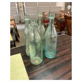 Three Antique Blue Water Bottles