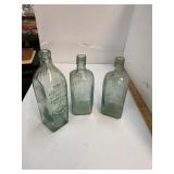 Three Antique Blue Liquor Bottles