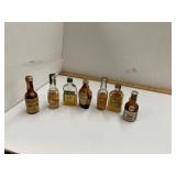 7 Vintage Glass Airplane Shooter Bottles