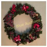 Decorative Christmas Wreath with Red Berries and P