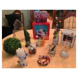 Assorted Christmas Figures, Candles, and Decoratio