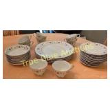 Elegant Vintage Dinnerware Set with Floral Design