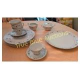 Elegant Vintage Porcelain Dinnerware Set with Flor