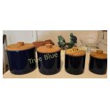 Set of Four Blue Ceramic Canisters with Cork Lids