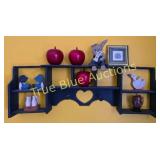 Charming Vintage Shelf Display with Whimsical Deco