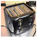 Vintage Black Toaster with Multiple Slots and Cont