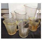 Set of Vintage Measuring Cups in Various Sizes and