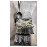 Stack of Metal Zigzag Clips Wrapped in Plastic