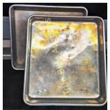 Two Metal Baking Sheets with Stains and Wear