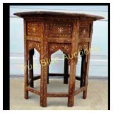 Intricately Carved Wooden Table with Inlay Design