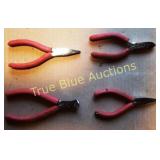 Assorted Hand Tools Including Pliers, Stapler, and