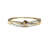 10K 2 TONE 9.8 GRAM DIAMOND BANGLE BRACELET