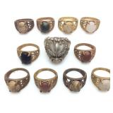 11 VINTAGE CARVED COLORED STONE RINGS