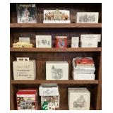 FULL CABINET OF SNOW VILLAGE CHRISTMAS FIGURINES
