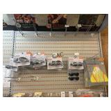 Shelf Lot of Safety Glasses and Vests