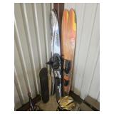 Lot of Water Skis, Skateboards and Helmet