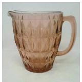 Pink glass pitcher.