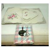 Embroidered placemats,  napkins