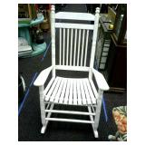 Cracker Barrel wooden rocking chair with cushions.