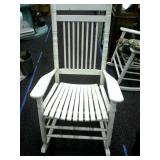 Cracker Barrel wooden rocking chair with cushions.